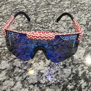 PIT VIPER Blue Lens Sport Shield Sunglasses with Red Wave Pattern